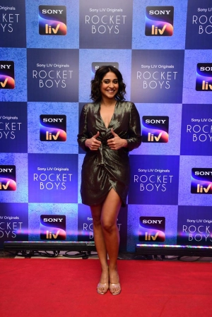 Regina Cassandra in Nirmooha's Brown Lurex Overlapping Draped Dress from the Ancienne Collection